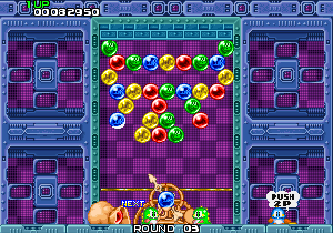 Una schermata della versione originale del gioco Puzzle Bobble